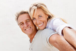 Older couple taking selfie