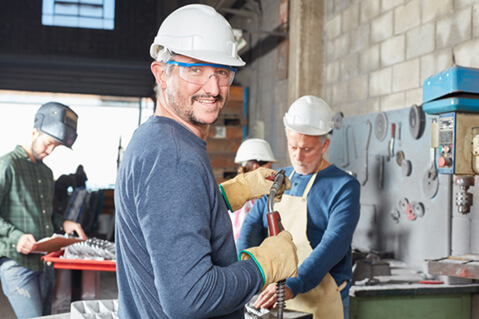 Man wearing safety glasses on job site