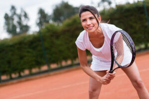 Young woman playing tennis